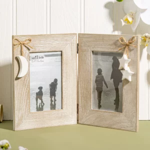 Moon and Stars Double Photo Frame on a table surrounded by flowers