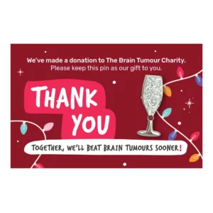 Festive Favour Champagne Glass Pin on a white background